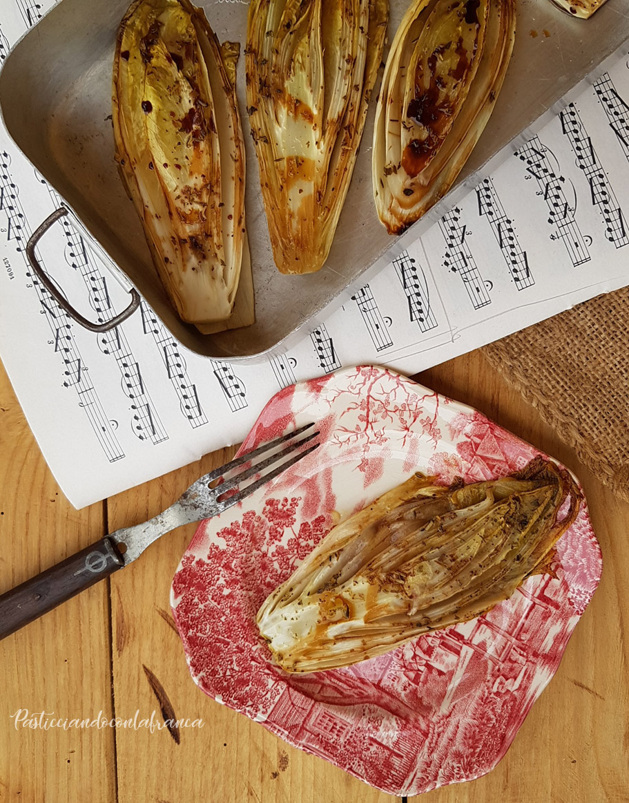 questa immagine rappresenta l' indivia belga in forno ricetta di pasticciandoconlafranca