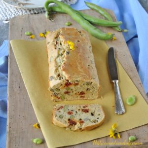 questa immagine rappresenta plumcake salato fave e pomodorini ricetta di pasticciandoconlafranca